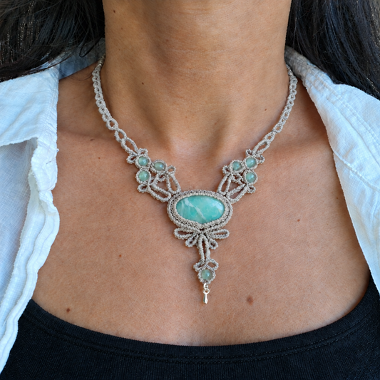 Necklace image with the central stone subtly lightened
